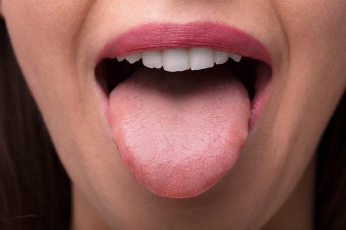 woman sticking her tongue out