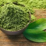 Green tea extract in a bowel with tea leaves